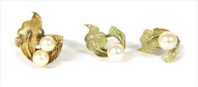 Lot 54 - A gold cultured pearl ring and earrings suite, c.1970