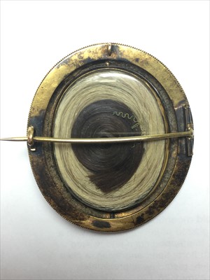 Lot 15 - A Victorian gold mourning brooch