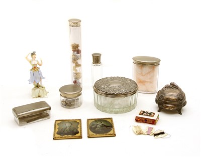 Lot 1082 - An early 20th century bone pin cushion and button winders