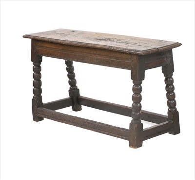 Lot 620 - An oak bench
