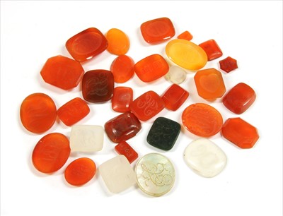 Lot 177 - A quantity of loose intaglio engraved hardstone seals
