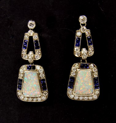 Lot 41 - A pair of white gold opal, diamond and sapphire drop earrings