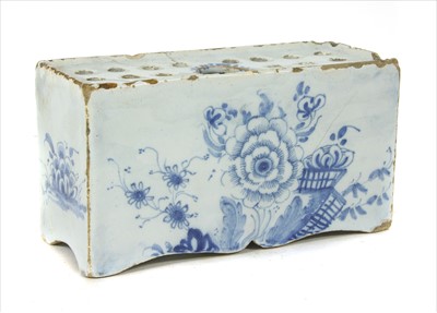 Lot 121 - An 18th century Delft flower brick