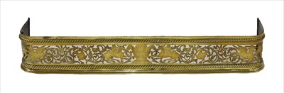 Lot 687 - A Dutch pierced brass fender