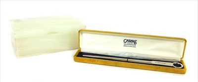Lot 194 - An Art Deco onyx and silver cigarette box
