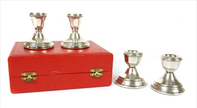 Lot 217 - A boxed pair of silver dwarf candlesticks