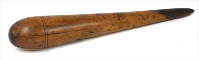 Lot 204 - A turned lignum vitae fid