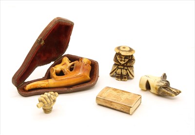 Lot 225 - A Japanese bone netsuke figure