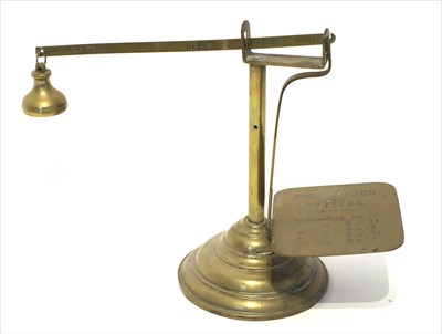 Lot 1114 - A brass steelyard scale