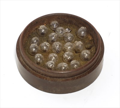 Lot 1128 - A set of nineteen numbered glass hydrostatic bubbles