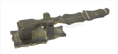 Lot 1184 - A brass sovereign rocker