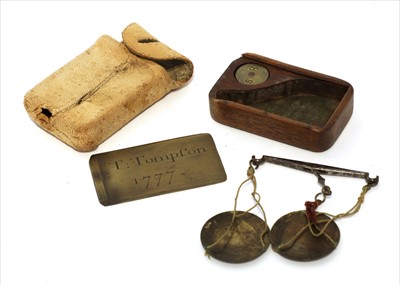 Lot 1185 - A miniature coin scale