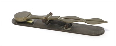 Lot 1188 - A brass folding column rocker