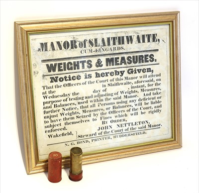 Lot 1191 - A cylindrical leather and brass sovereign case