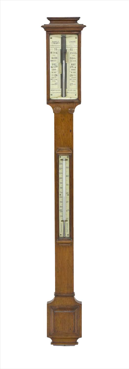 Lot 903 - An oak stick barometer