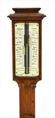 Lot 903 - An oak stick barometer