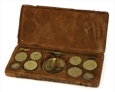 Lot 1004 - An Italian coin scale