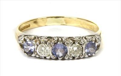 Lot 93 - A 9ct gold tanzanite and diamond five stone ring