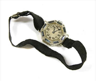 Lot 141 - A gold Royce sapphire and diamond set mechanical cocktail watch