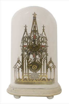 Lot 621 - A brass skeleton clock