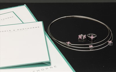 Lot 262 - An 18ct white gold diamond and pink sapphire 'flower press' necklace, ring and earrings suite