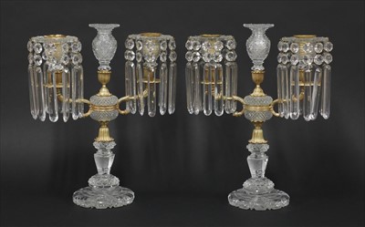 Lot 27 - A pair of cut-glass and gilt metal candelabra