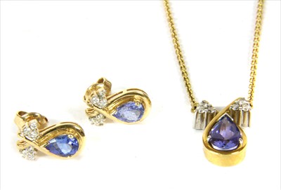 Lot 92 - An 18ct gold tanzanite and diamond necklace