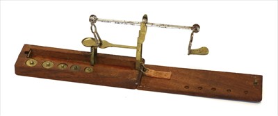 Lot 1032 - A brass and steel folding gold balance
