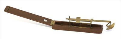 Lot 1033 - A brass unequal arm coin scale