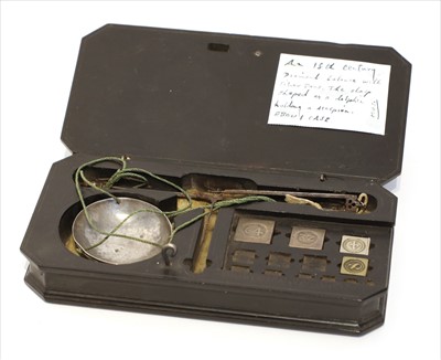 Lot 1040 - An ebony cased diamond scale