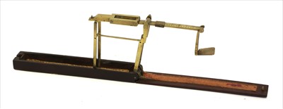 Lot 1051 - A rosewood cased folding brass coin scale