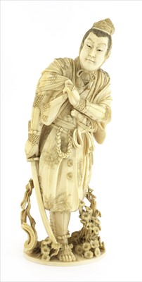 Lot 154 - A Japanese ivory okimono