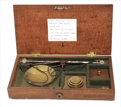 Lot 1098 - A fiddle back mahogany cased coin scale