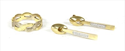 Lot 83 - A pair of 18ct gold diamond earrings