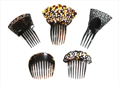 Lot 238 - Four tortoiseshell hair combs