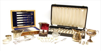 Lot 244 - A collection of silver and white metal items