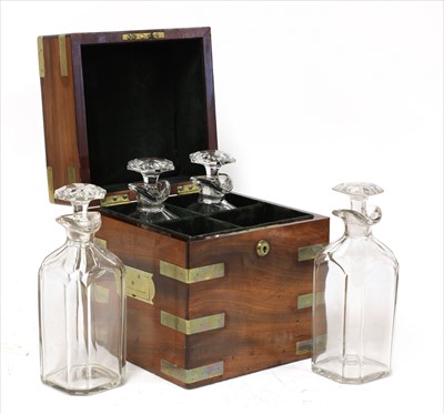 Lot 101 - A mahogany and brass-bound four-bottle decanter box