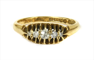 Lot 4 - An 18ct gold boat shaped five stone diamond ring