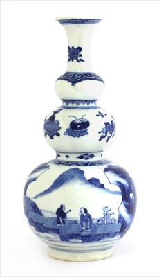 Lot 7 - A Chinese blue and white triple gourd vase