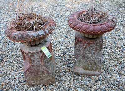 Lot 120 - A pair of terracotta urns