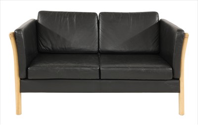 Lot 430 - A Danish beech and leather two-seater settee
