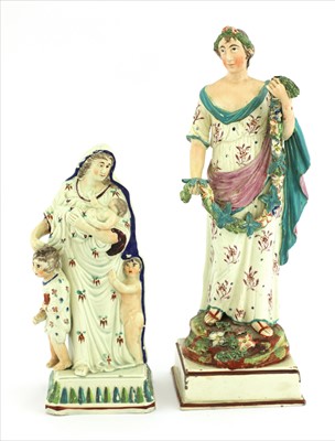 Lot 7 - Five creamware figures