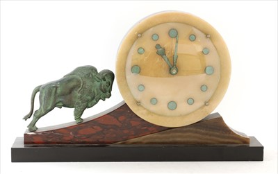Lot 145 - An Art Deco marble and spelter clock