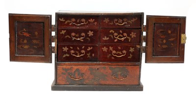Lot 239 - A Japanese lacquered and parquetry table cabinet