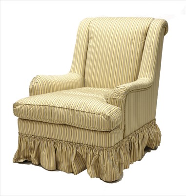 Lot 785 - A large upholstered armchair
