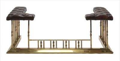 Lot 730 - A brass and leather club fender