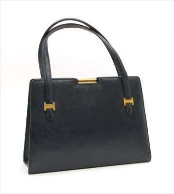 Lot 1004 - A vintage Gucci blue leather Handbag