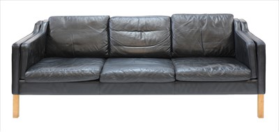 Lot 501 - A Danish black leather three-seater settee