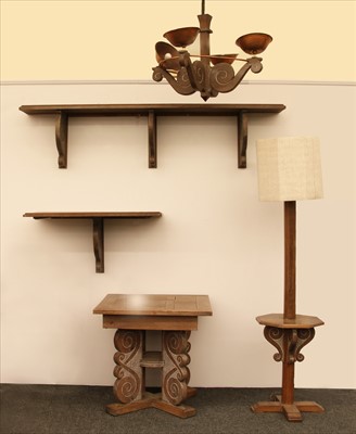 Lot 116 - A French suite of carved oak furniture