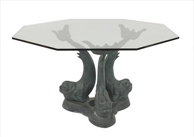 Lot 423 - An octagonal glass dining table